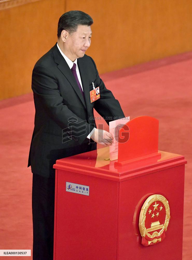 Xi re-elected as China's president, his confidant becomes No. 2