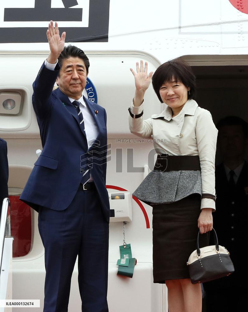 Japan PM Abe departs for summit with Trump