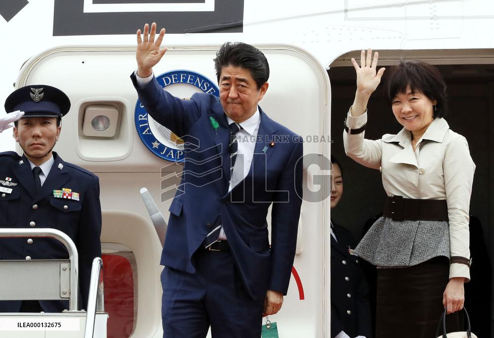 Japan PM Abe departs for summit with Trump