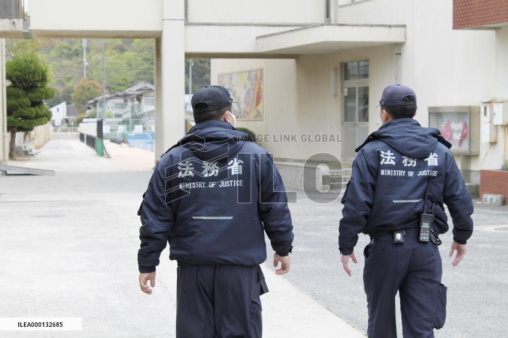 Security boosted at schools on island where fugitive is hiding