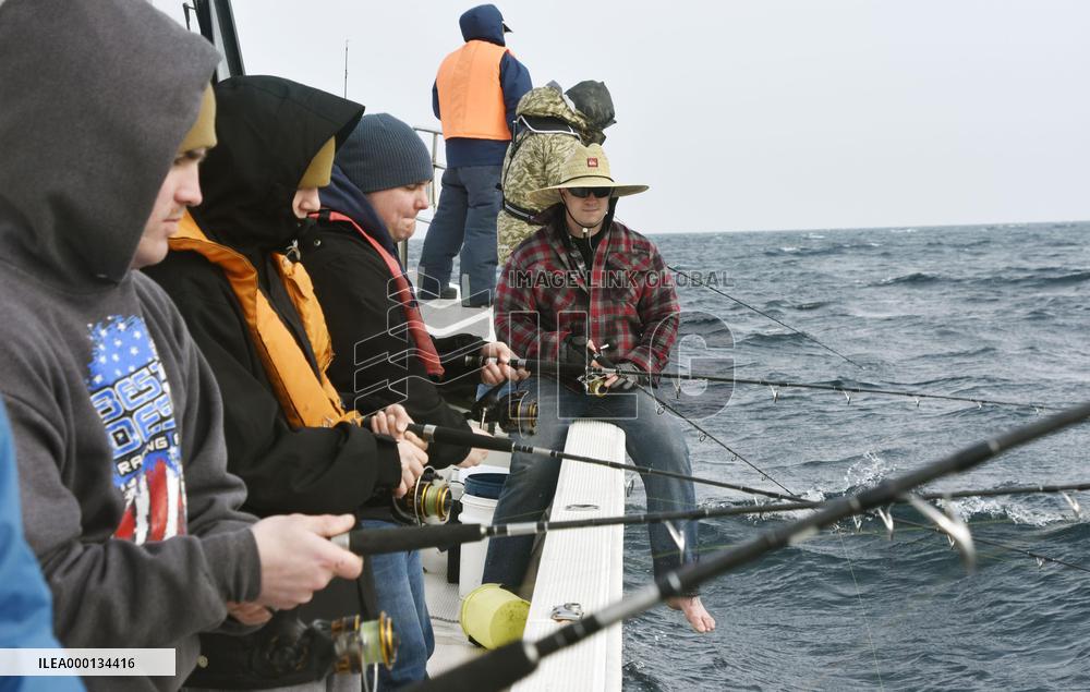 Ex-serviceman's tours near base drawing U.S. military folk in Japan