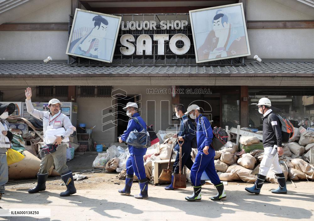 Volunteers at flood-hit areas in western Japan