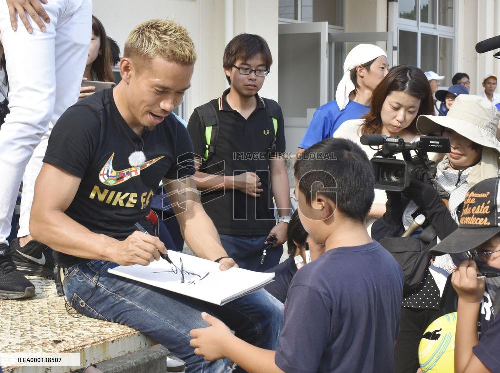 Nagatomo in rain-hit area in Japan