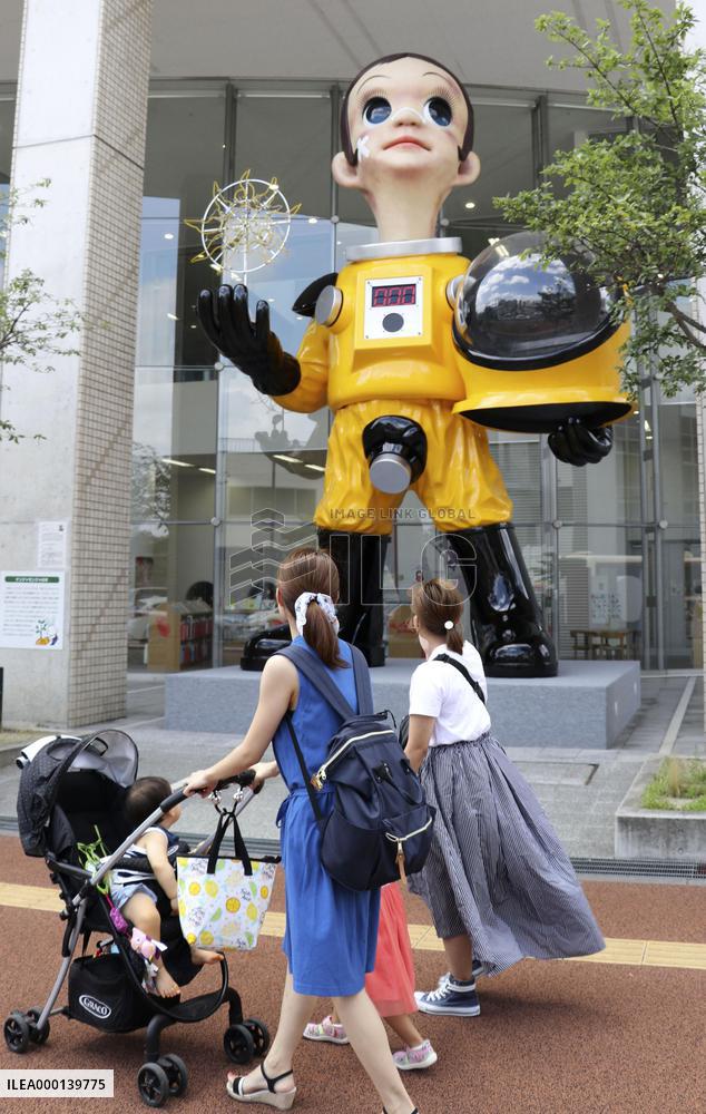 Child statue in protective suit in crisis-hit Fukushima
