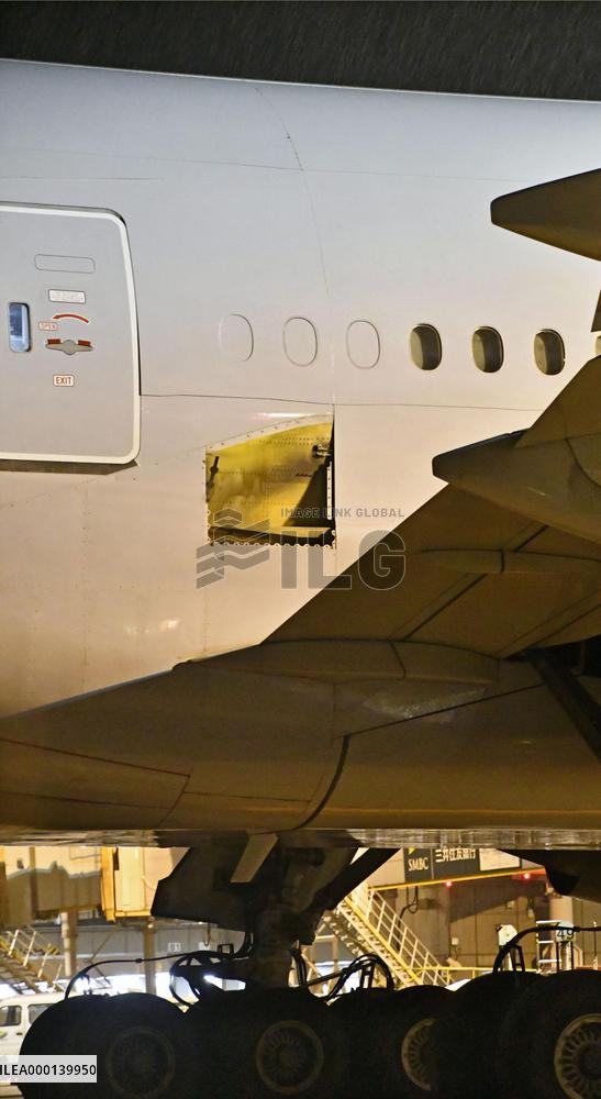 Airplane arrives with missing panel