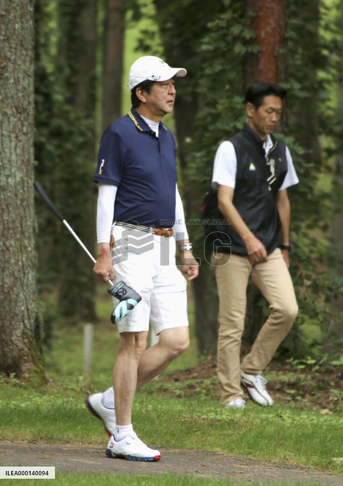 Japan PM Abe playing golf
