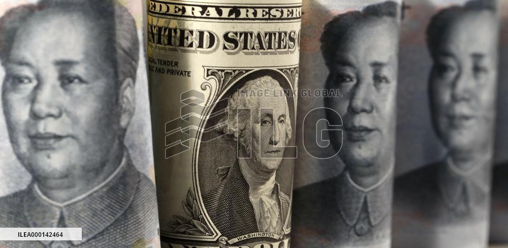 U.S. dollars and Chinese yuan bills