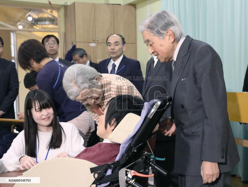 Emperor and empress visit facility for disabled