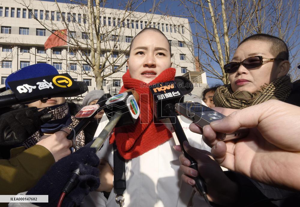 Wife of detained Chinese civil rights lawyer Wang