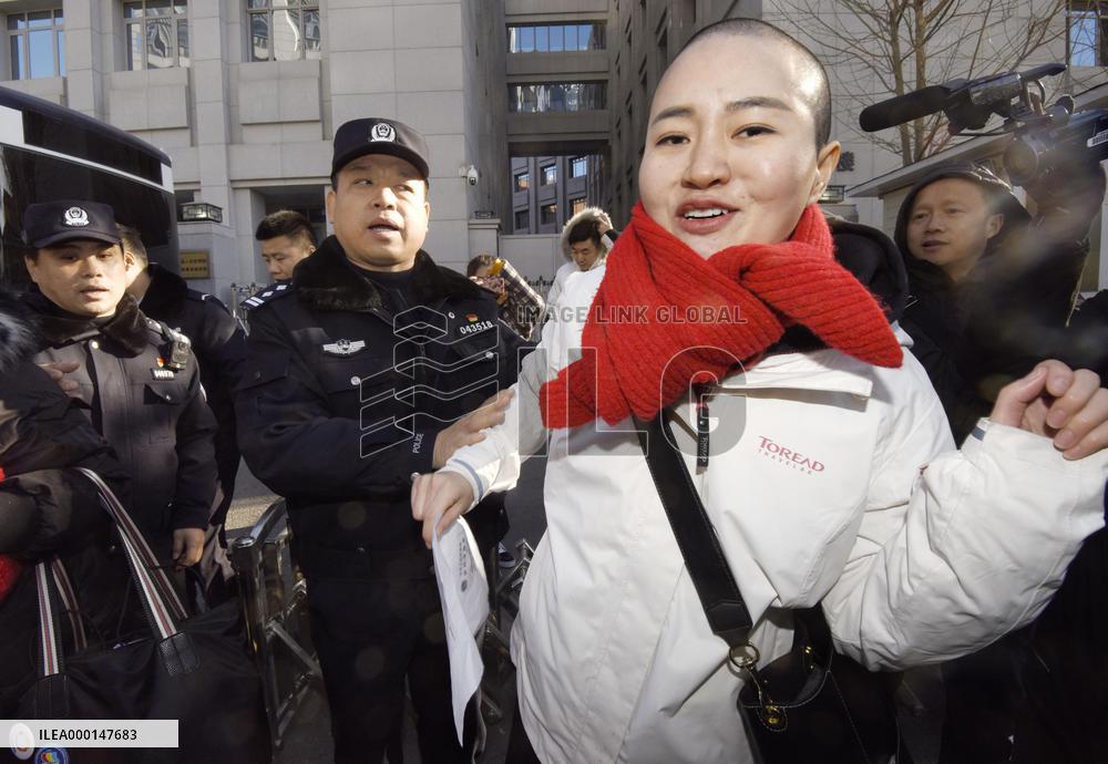 Wife of detained Chinese civil rights lawyer Wang