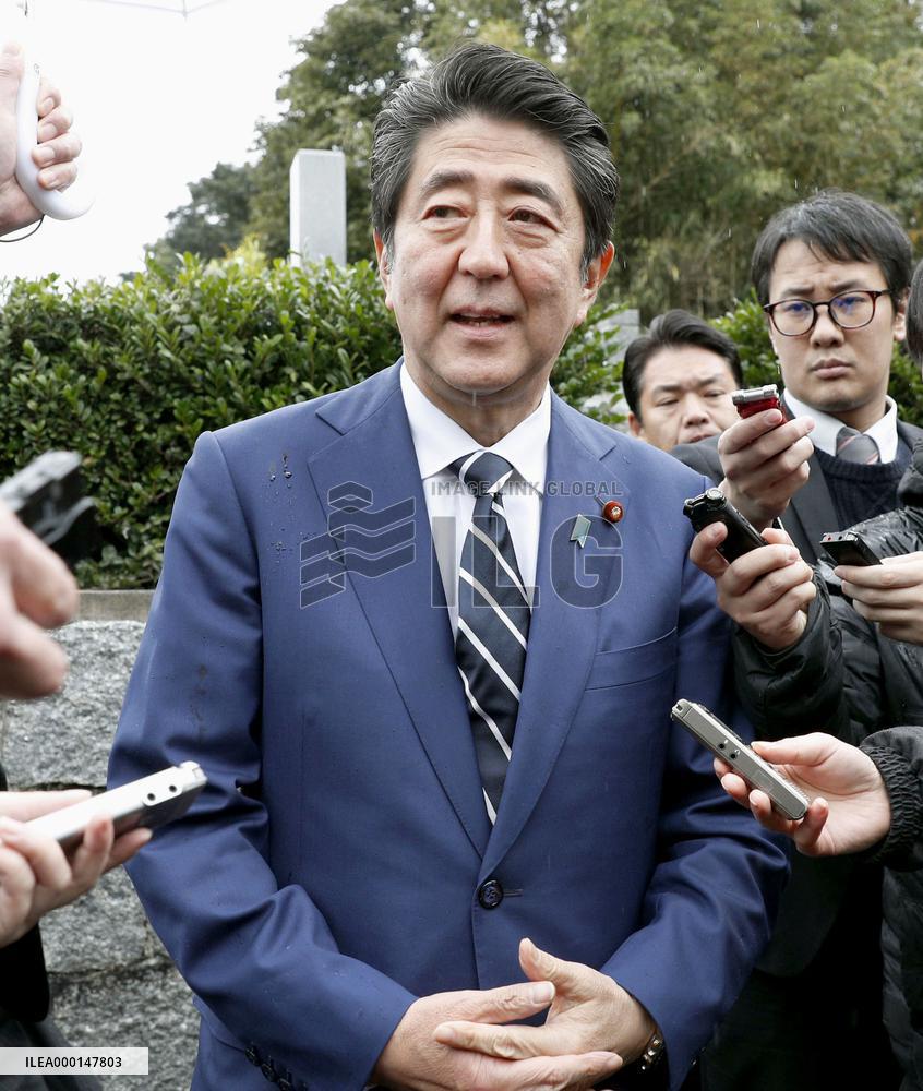 Japan PM Abe visit to father's grave
