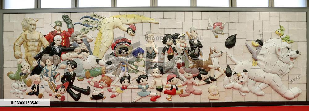 Relief with Osamu Tezuka's cartoon characters