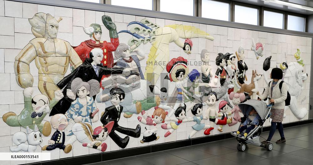 Relief with Osamu Tezuka's cartoon characters