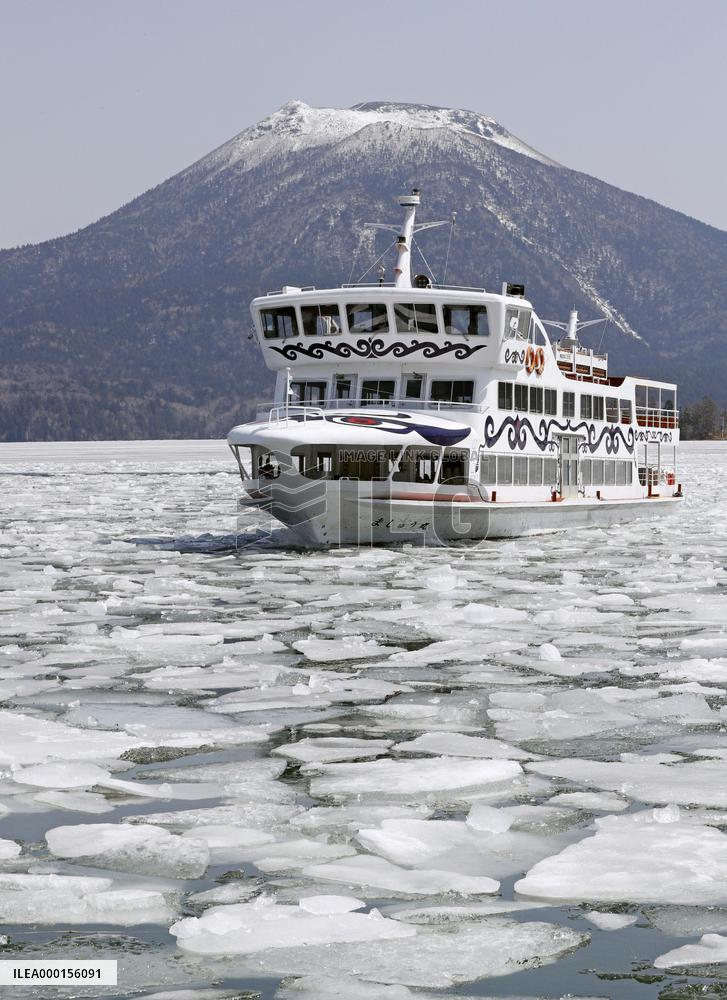 Sightseeing boat on icy Lake Akan in Hokkaido