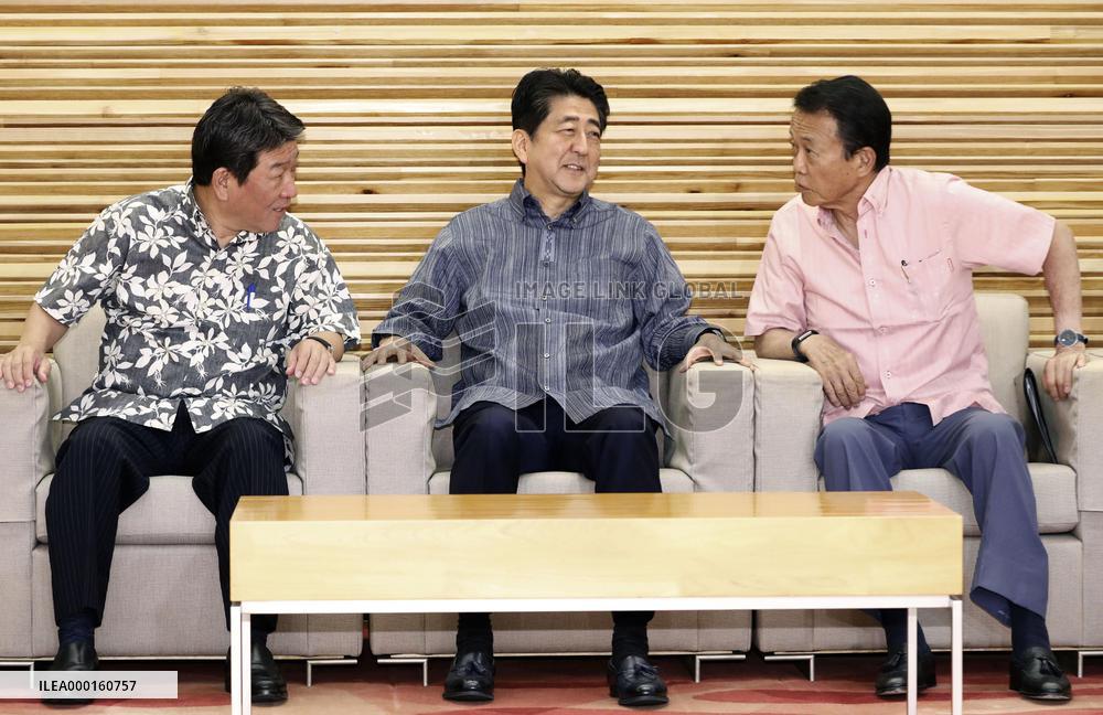 Japanese ministers in Okinawa shirts