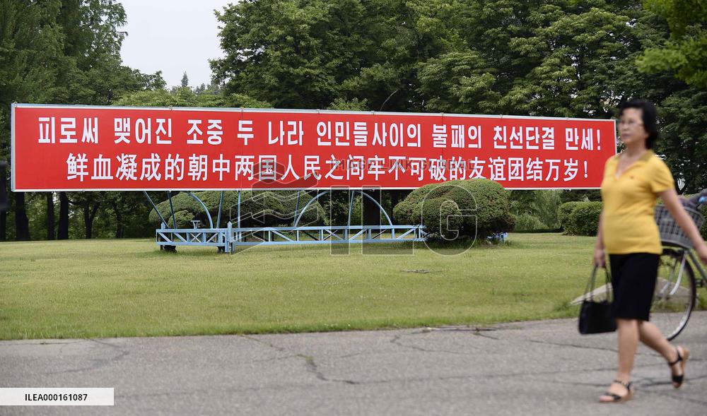 Xi visits N. Korea