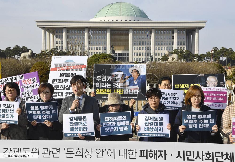Protest against bill to settle wartime labor row with Japan