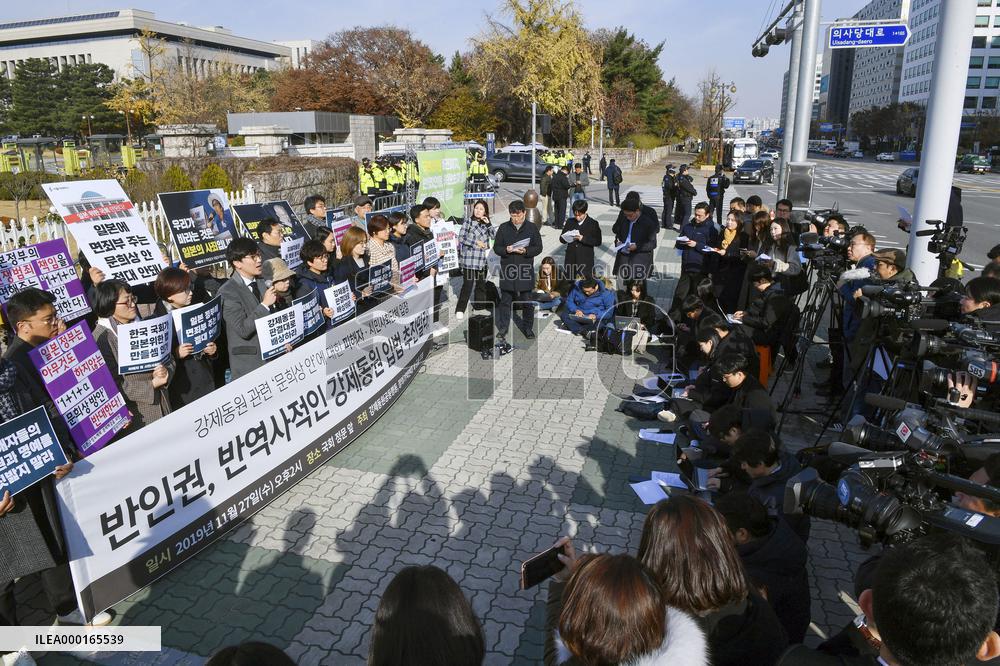Protest against bill to settle wartime labor row with Japan