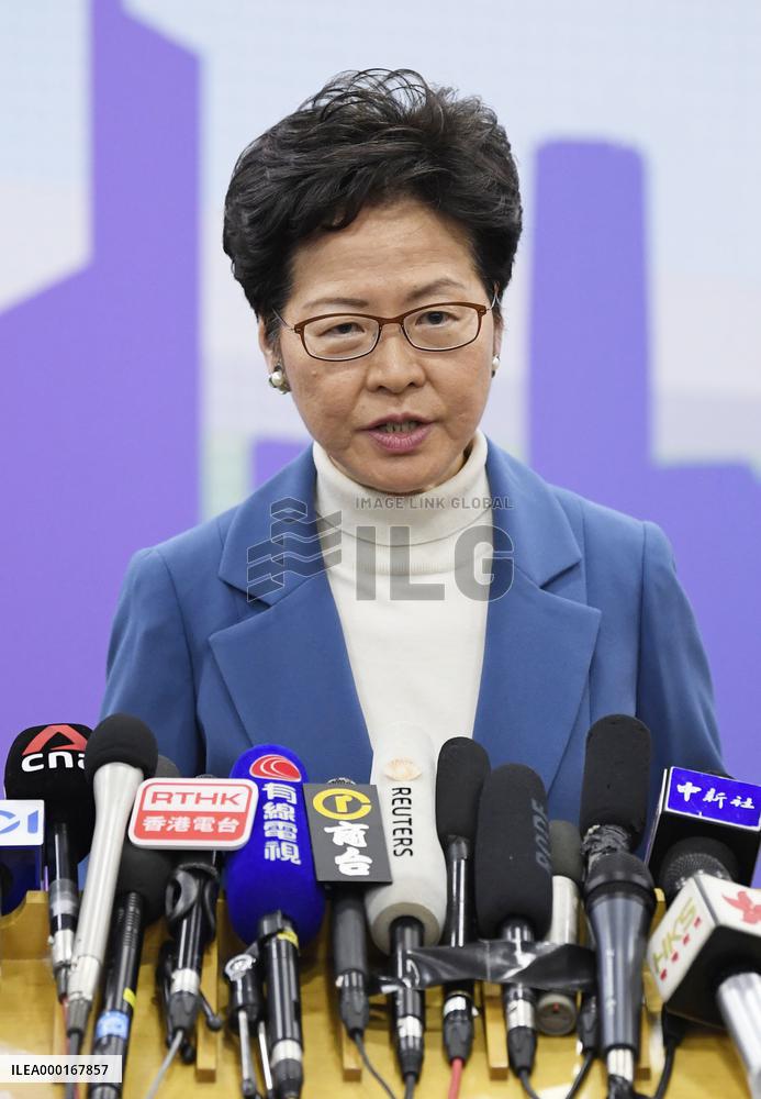 Hong Kong chief in Beijing