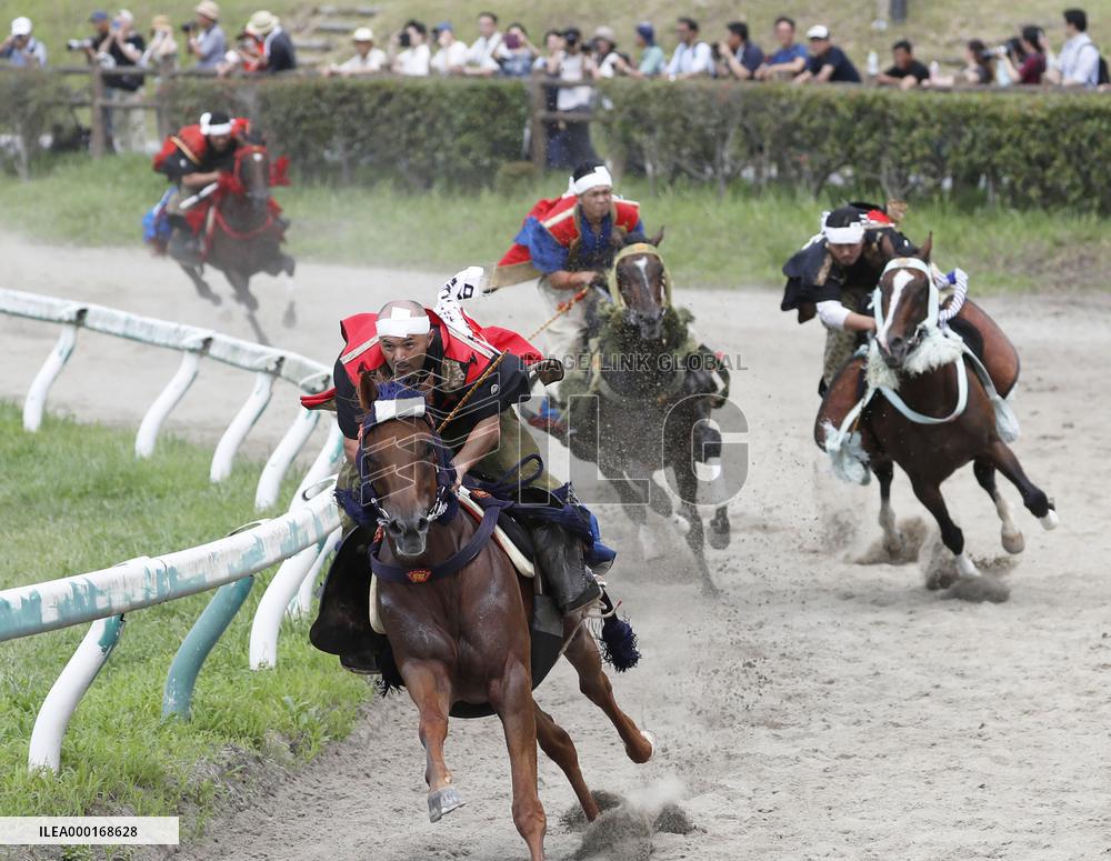 Armored warriors compete in horse race