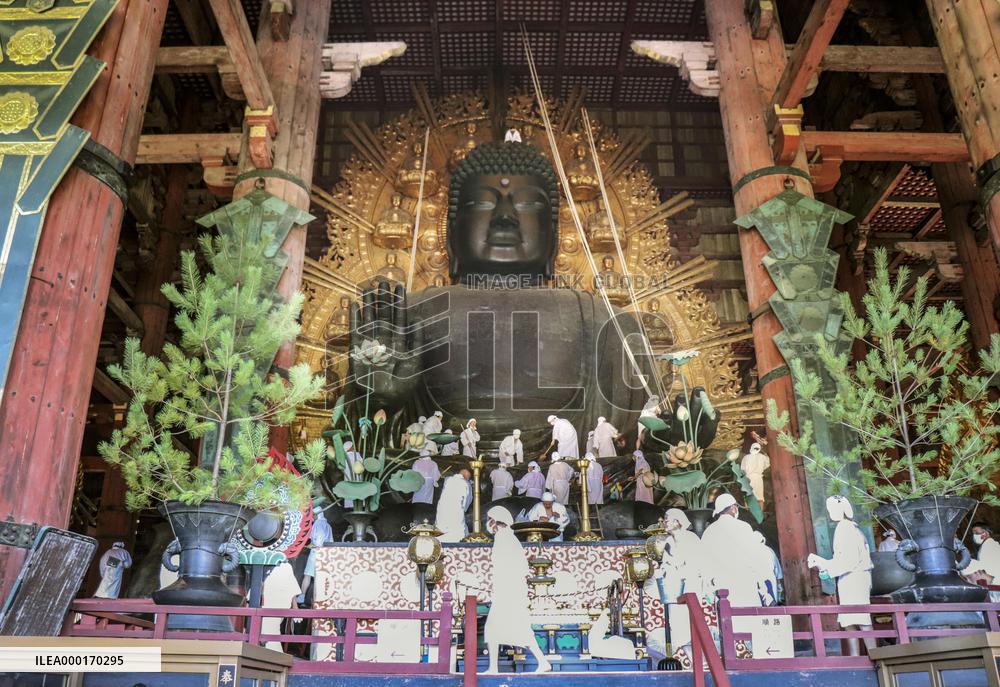 Annual cleaning of Great Buddha of Nara