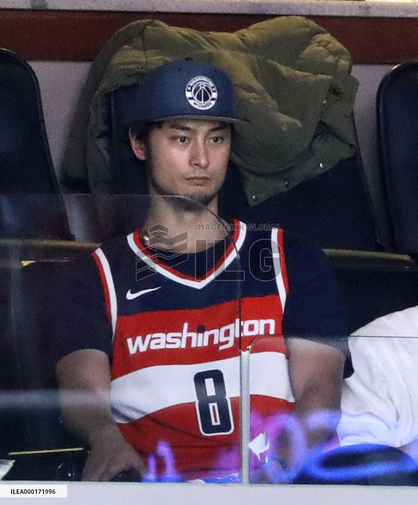 Cubs pitcher Darvish watches NBA game