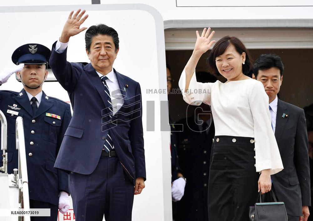 Japan PM Abe leaves for G-7 summit