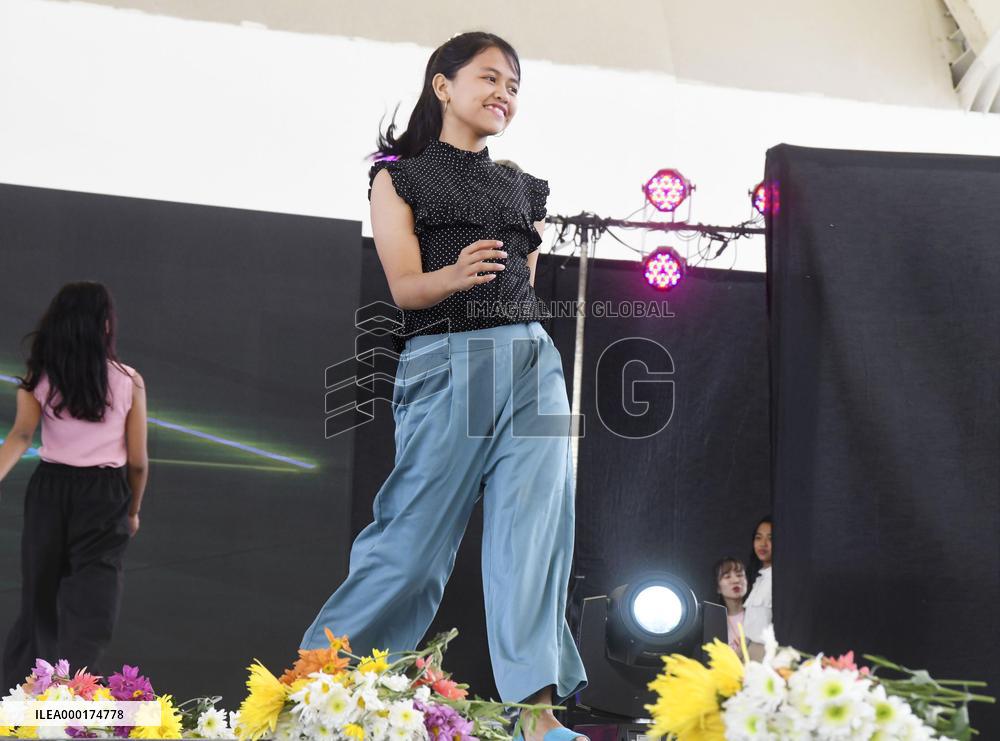 Fashion show by children in poverty
