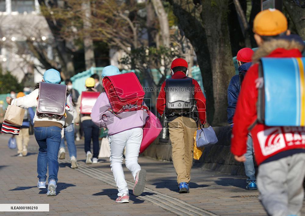 Some schools in Japan resume classes after virus-prompted closures