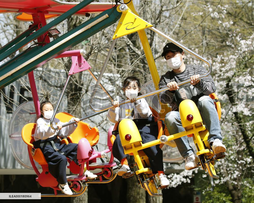 Reopening of Tokyo amusement park after virus-led closure