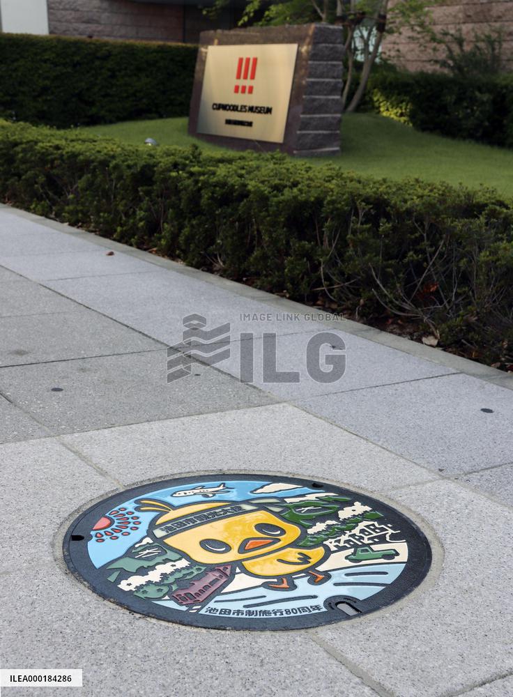 Ramen mascot depicted on manhole cover