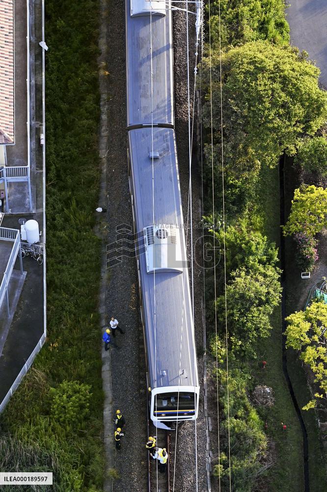 Derailed train car in Japan