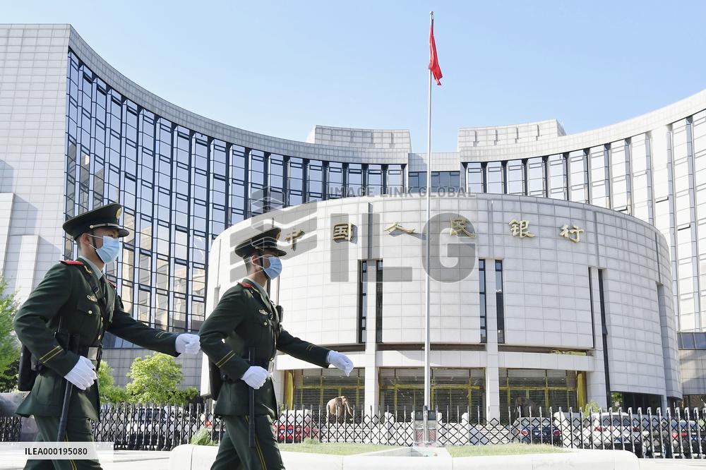 China leaves benchmark lending rate unchanged