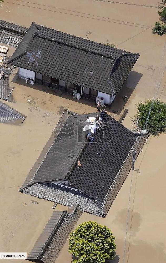 Torrential rain triggers massive flooding in southwestern Japan