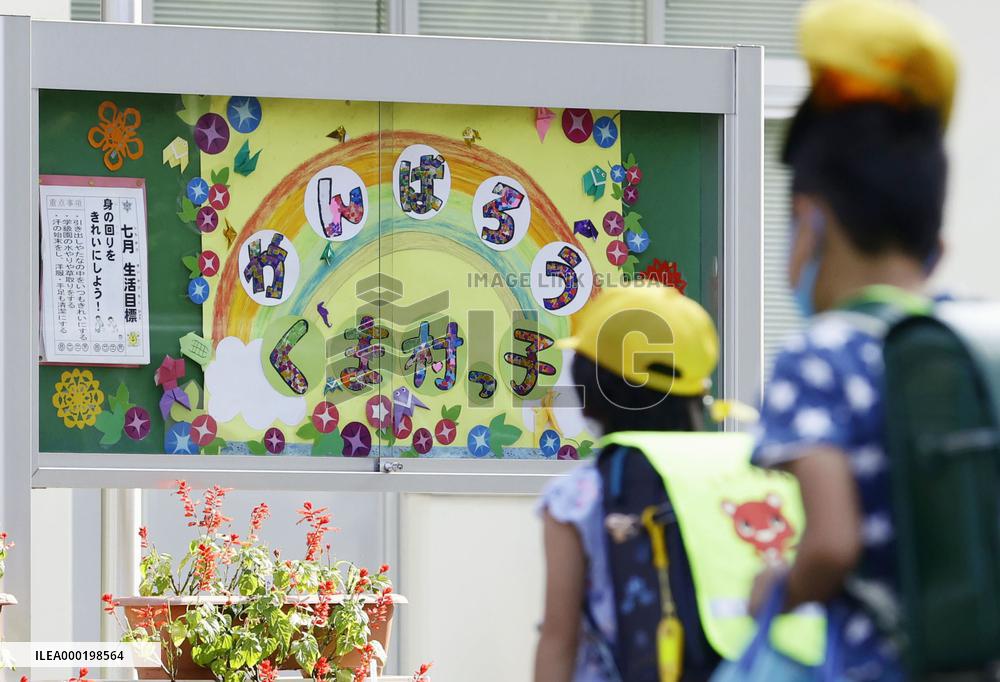 School reopening after flooding closure in southwestern Japan
