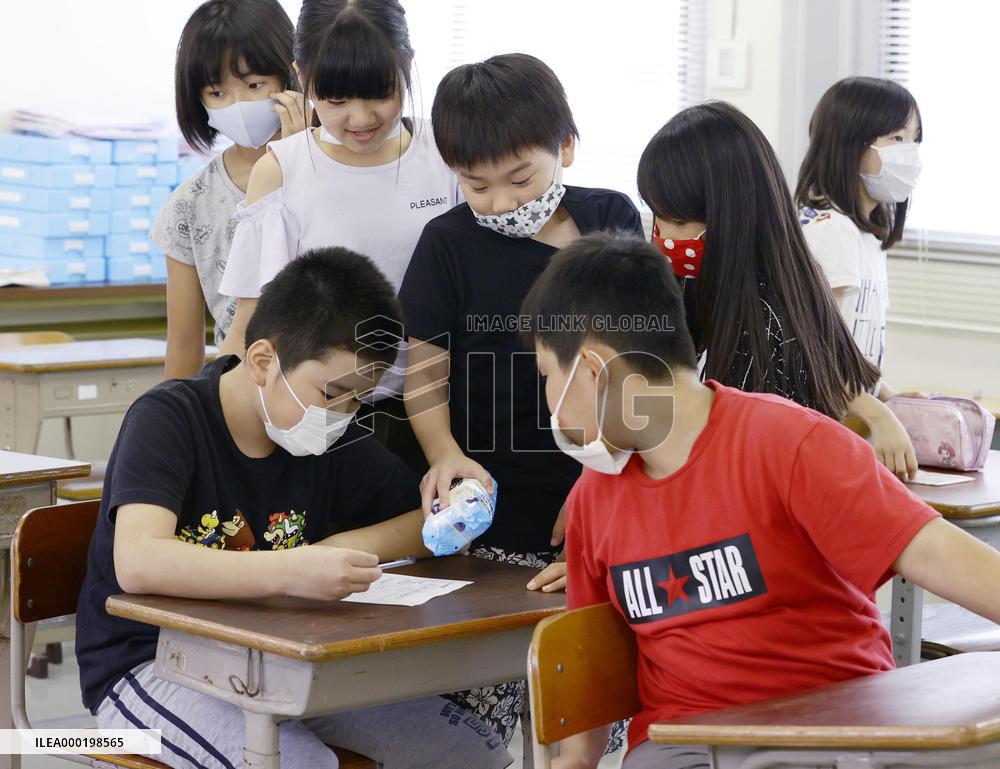 School reopening after flooding closure in southwestern Japan