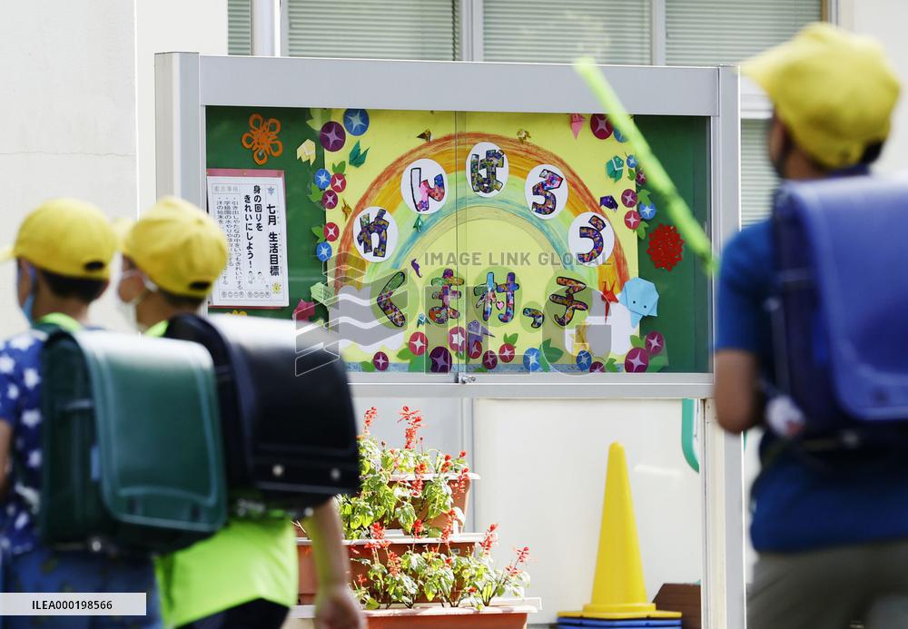 School reopening after flooding closure in southwestern Japan