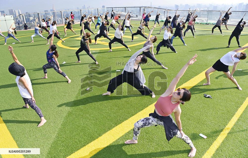 Rooftop yoga in Tokyo