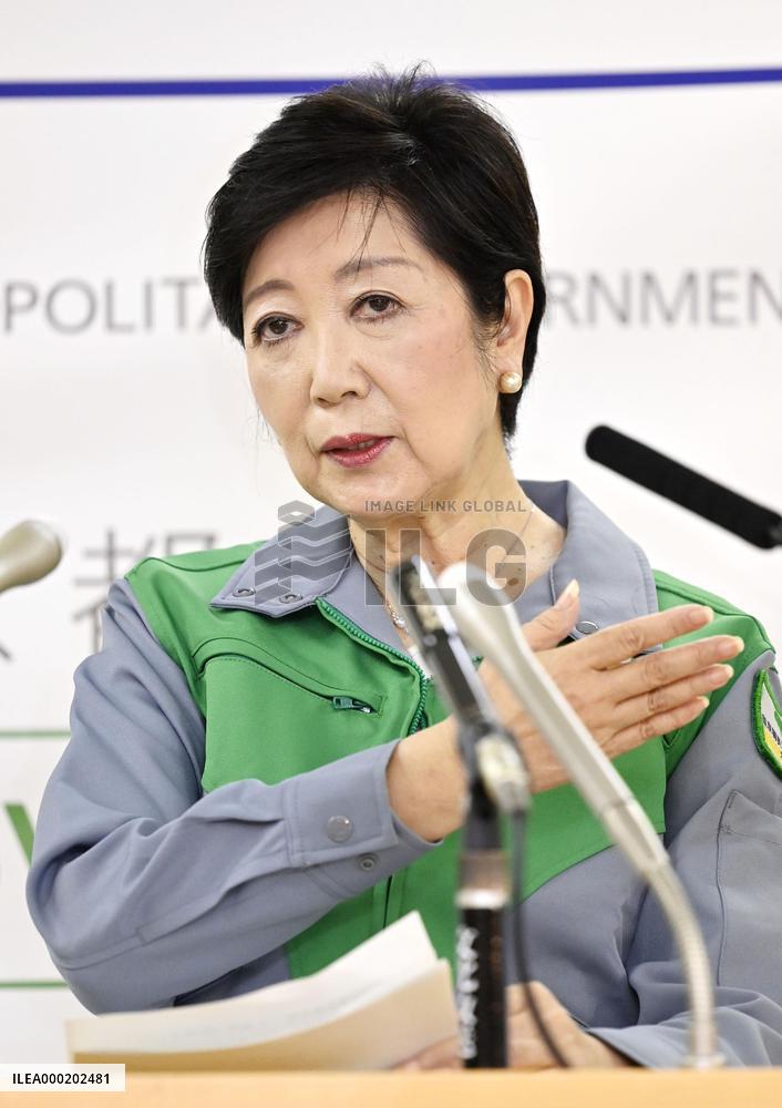 Tokyo lowers coronavirus alert level