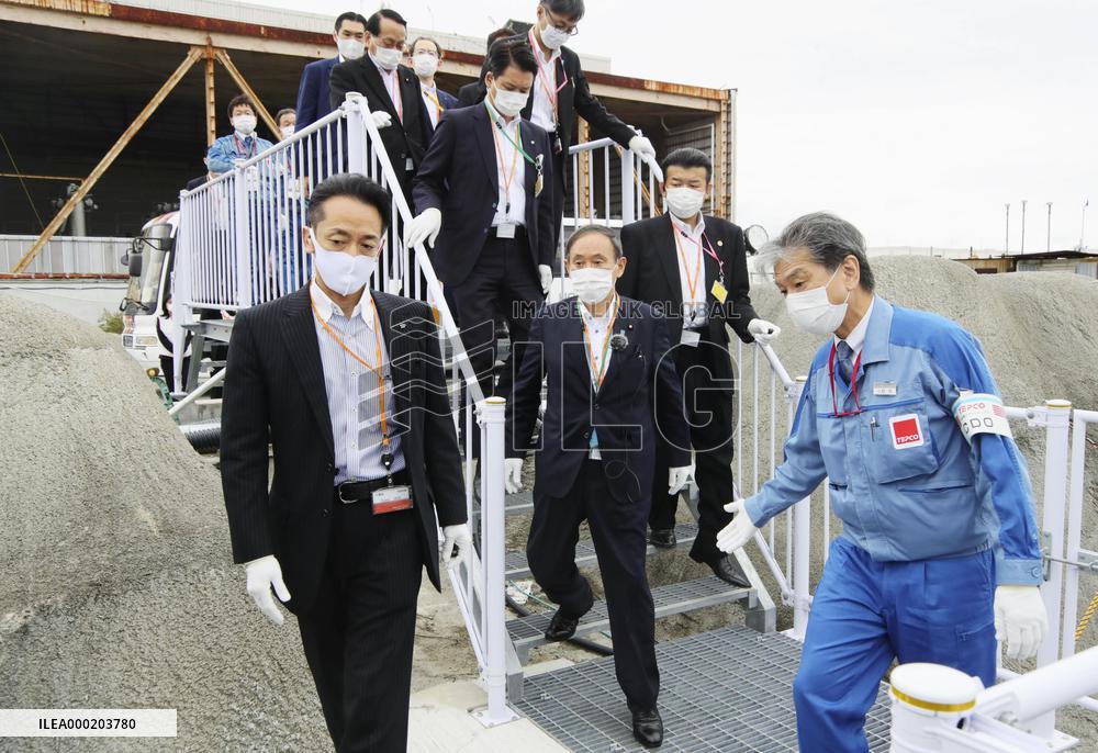 Japan PM Suga visits disaster-hit Fukushima nuclear power plant