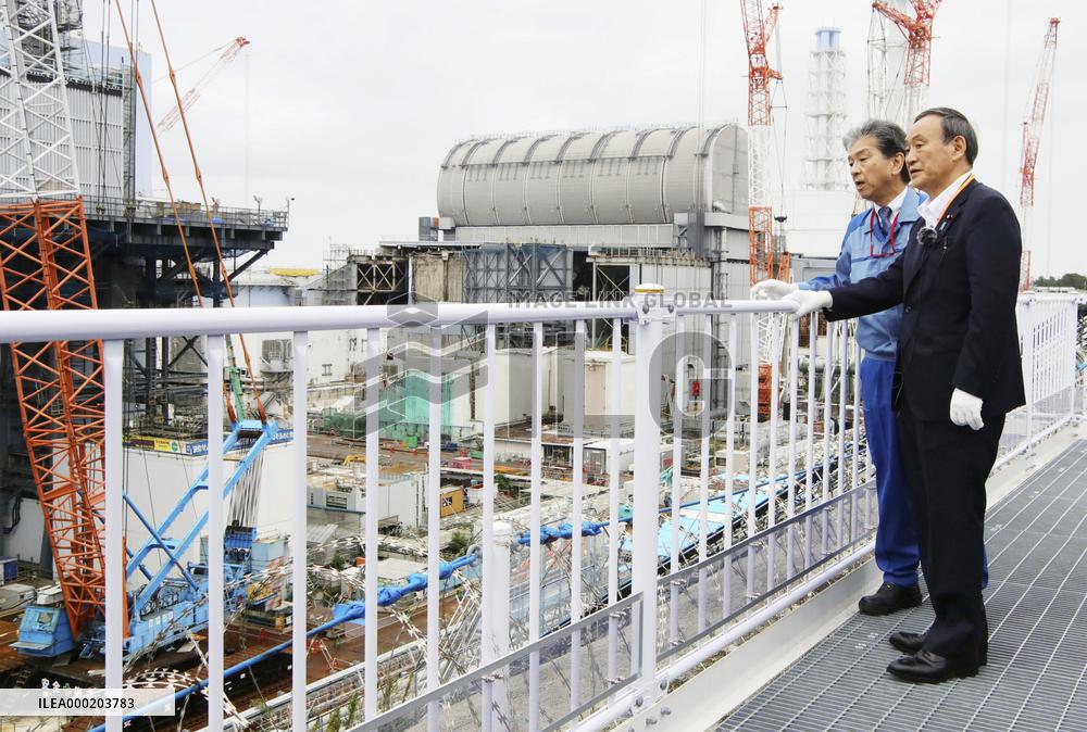Japan PM Suga visits disaster-hit Fukushima nuclear power plant