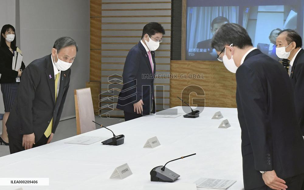Japan PM Suga at economic report meeting