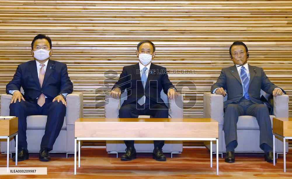 Japan Cabinet OKs 73.6 tril. yen new stimulus to fight virus