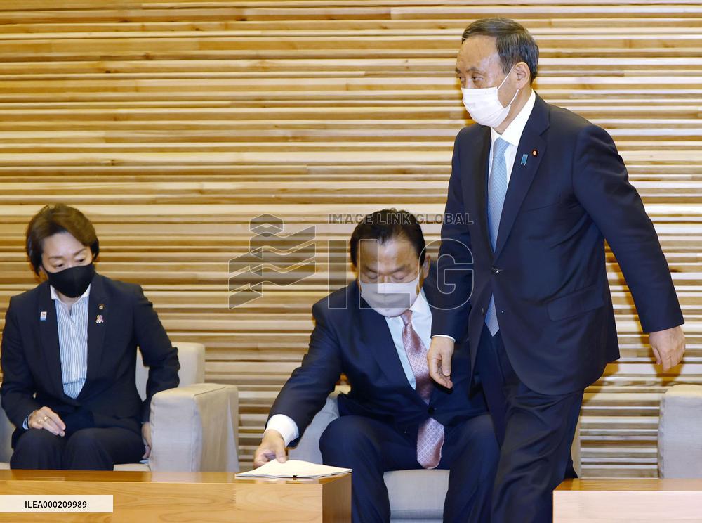 Japan Cabinet OKs 73.6 tril. yen new stimulus to fight virus