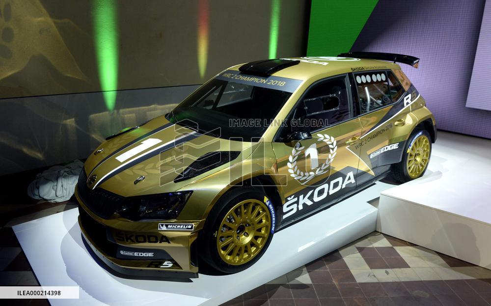 modernized rally car Skoda Fabia R5 by Skoda Motorsport, gold version