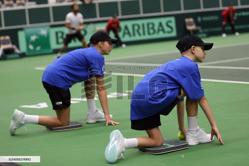 Tennis ball girl and boy