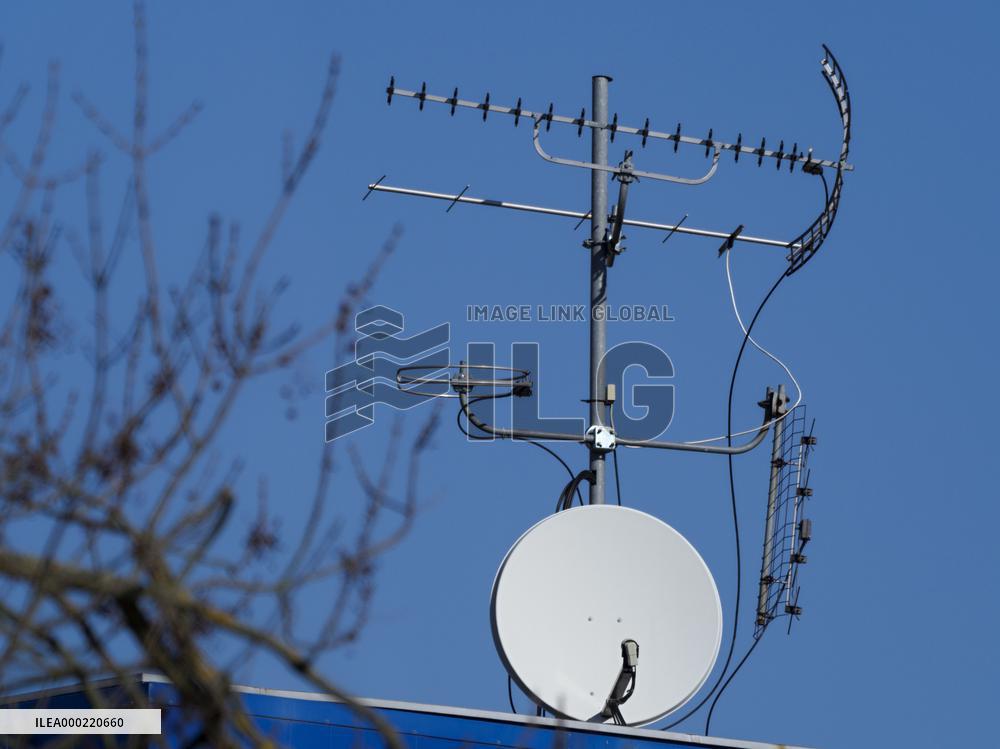 Antennas on a blue sky background