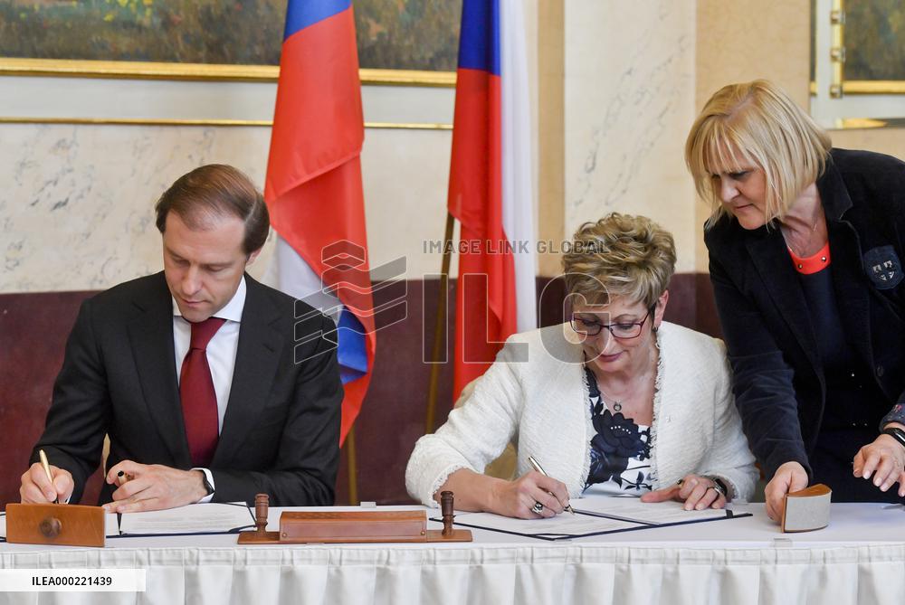 Marta Novakova, Denis Manturov