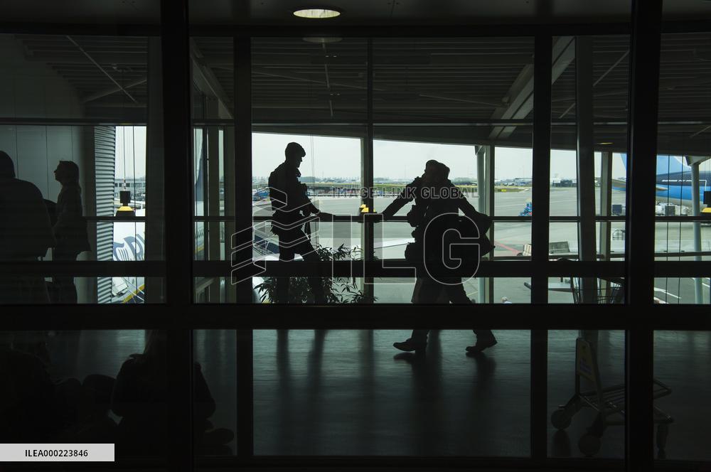 Schiphol Airport, Amsterdam, heavy armed policemen patrol, safety precautions