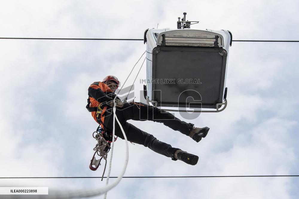joint exercise of Czech and Polish firefighters on chairlift to Snezka Mountain in the Giant Mountains (Krkonose)